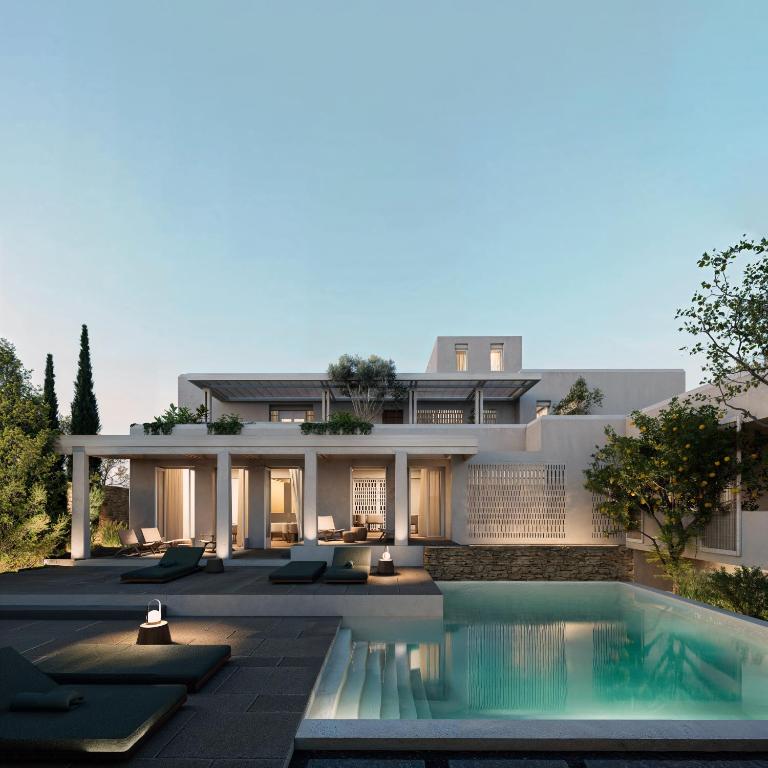 an exterior view of a house with a swimming pool at Meros, Santikos Collection in Naousa