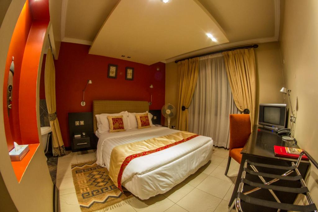 Postel nebo postele na pokoji v ubytování Hillpark Hotel