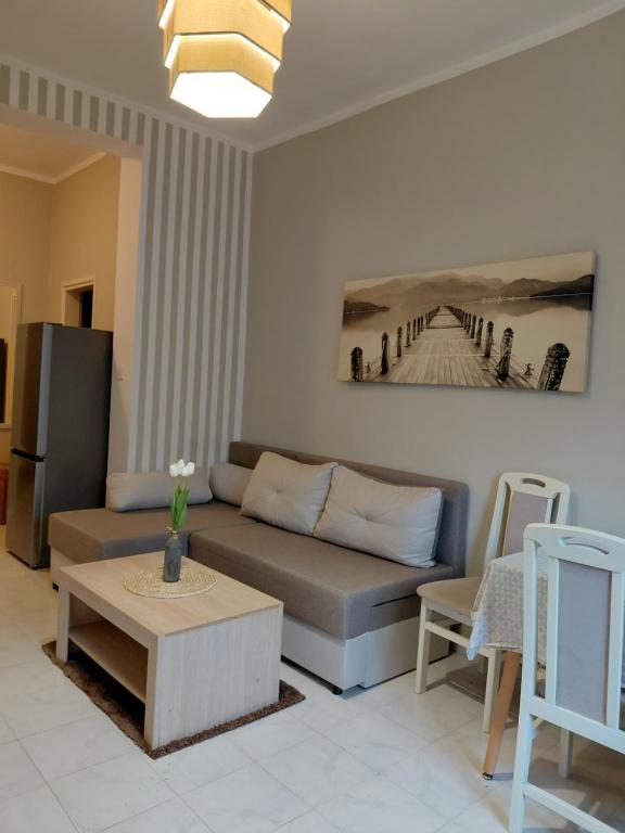 a living room with a couch and a table at Bonaca in Igalo