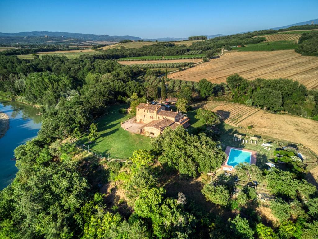 an aerial view of an estate with a river at Agriturismo Podere Santo Stefano in Cinigiano
