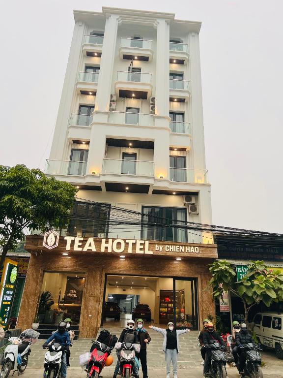 a group of motorcycles parked in front of a hotel at Tea Hotel by Chien Hao in Ha Giang
