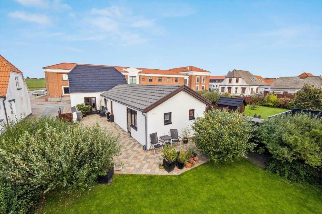 an aerial view of a house with a yard at 1075-Hanstholm-Badsgardsvej-25 in Hanstholm