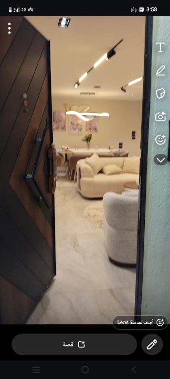a view of a living room with couches and tables at شارع الاربعين حديقه بدر in Cairo