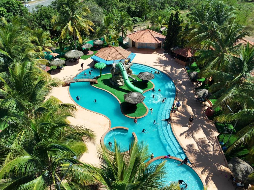 an aerial view of a pool at a resort at Paradise Resort in Los Santos