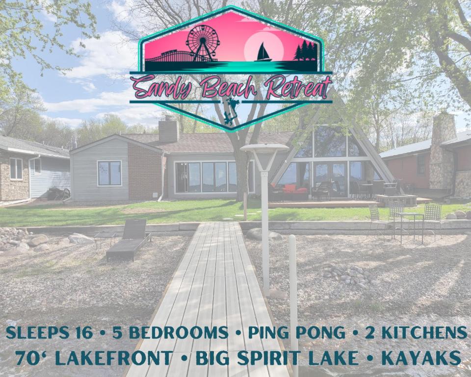 a sign for a santa barbaraault restaurant in a park at Sandy Beach Retreat on Big Spirit Lake in Spirit Lake