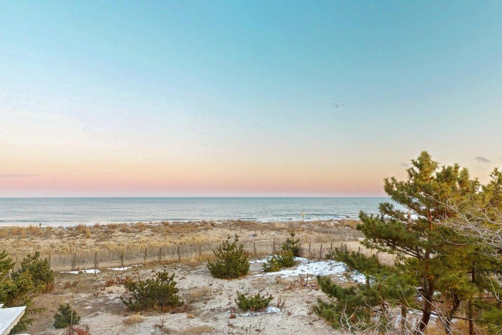a view of the beach at sunset at Sun Mark 253 in Ocean City