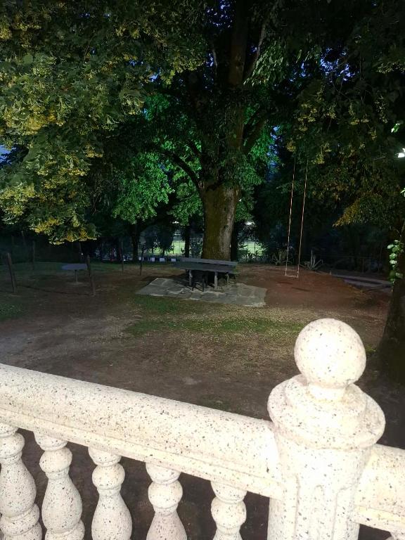 a park with a bench and a picnic table at Food Delivery Taxi AI Powered Support in Martvili