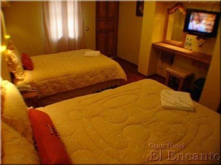 Postel nebo postele na pokoji v ubytování Gran Hotel El Encanto