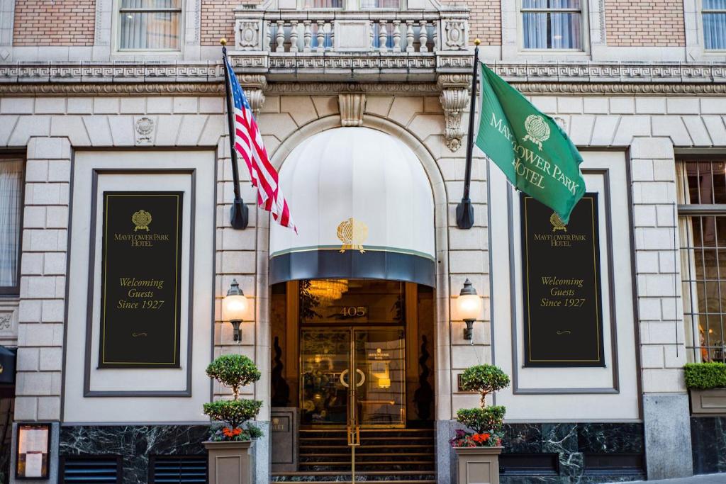 a building with two flags in front of it at Mayflower Park Hotel in Seattle