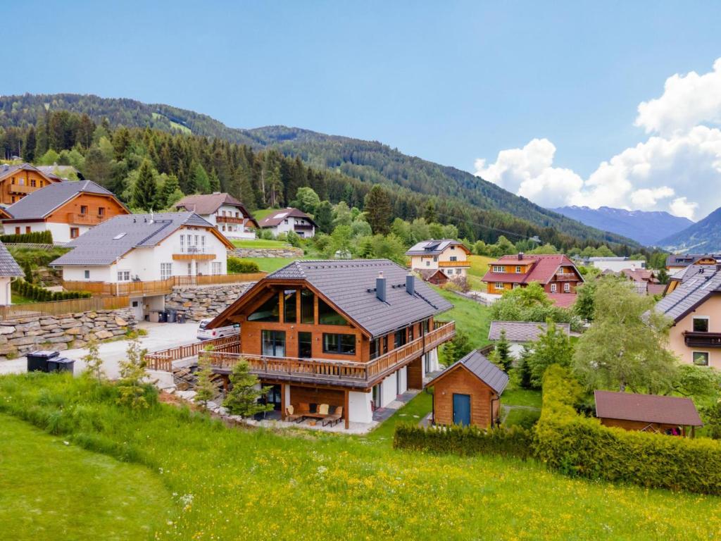 an aerial view of a house in a village at Alpinn Wellness 2 in Sankt Margarethen im Lungau