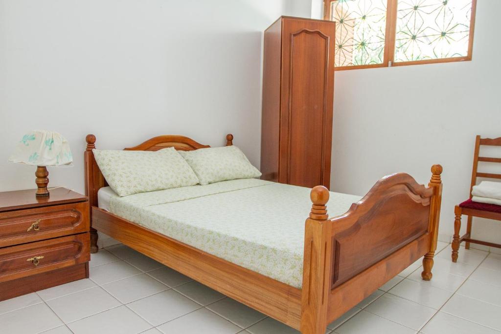 Postel nebo postele na pokoji v ubytování Arla Residential