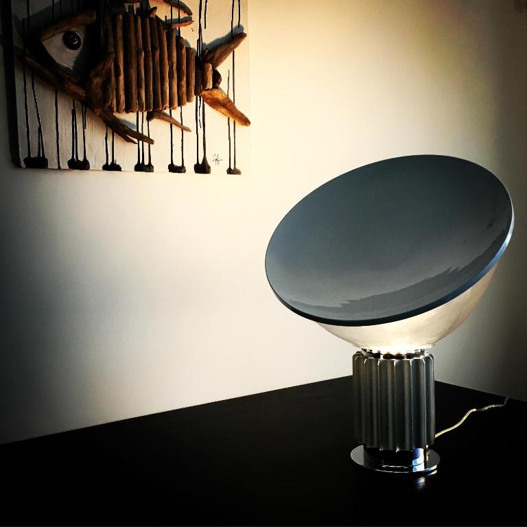 a chair sitting on a table in a room at Residenza RoMa in Tropea