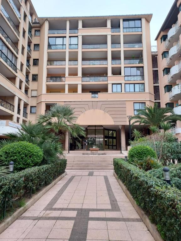a building with a walkway in front of it at Cap ô sud 2 in Cannes