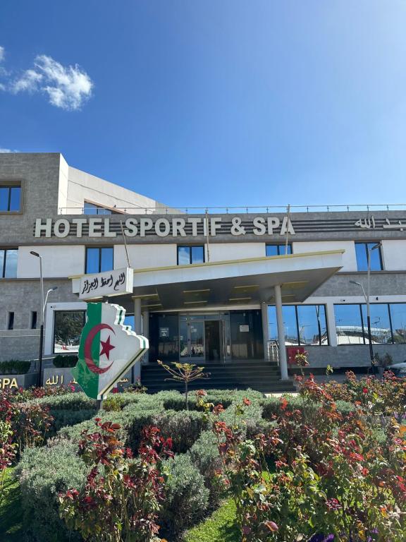 a hotel with a sign in front of a building at Auberge Complexe Medina Parc in Mahelma