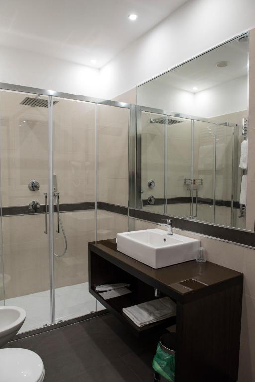 Kúpeľňa v ubytovaní Archeo Hotel