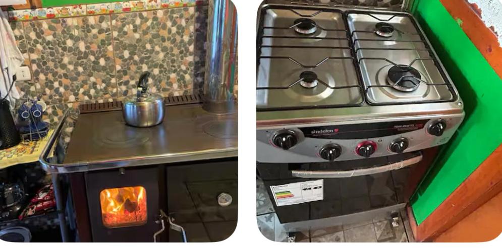 a stove with a pot on top of it at Cabaña Piola Quilquico in Castro