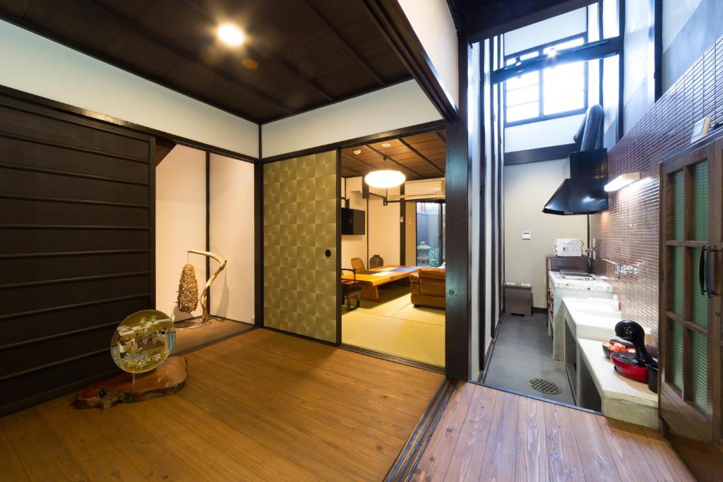 En eller flere senge i et værelse på Kyotoya Suzakuan