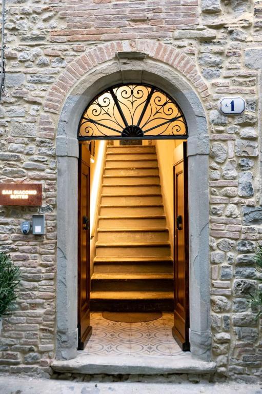 an entrance to a building with a set of stairs at San Giacomo Suites in Città di Castello