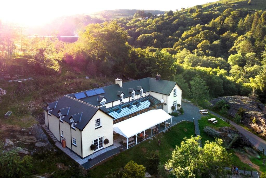 an aerial view of a house with a swimming pool at Ty Penbont House in Rhayader