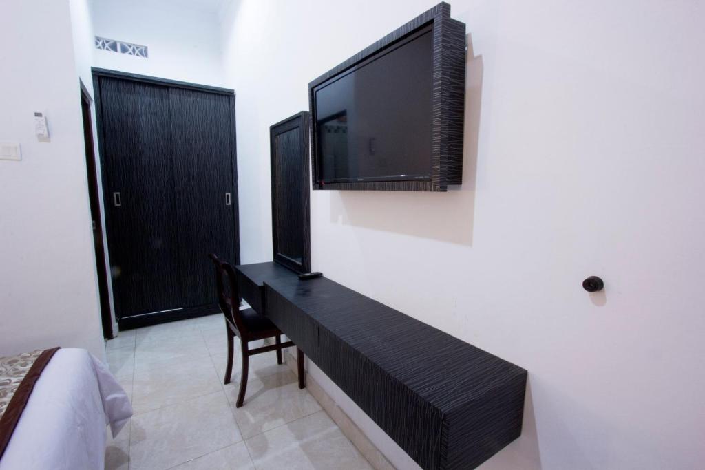 TV a/nebo společenská místnost v ubytování Asta House