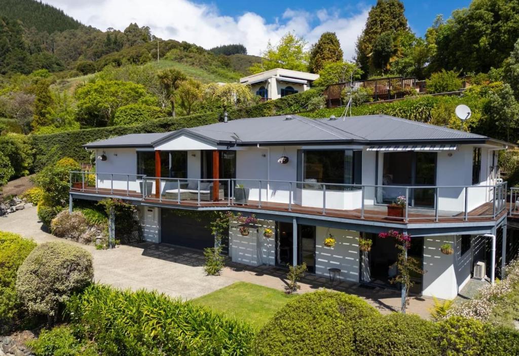 an aerial view of a house on a hill at Nelson Escape in Nelson
