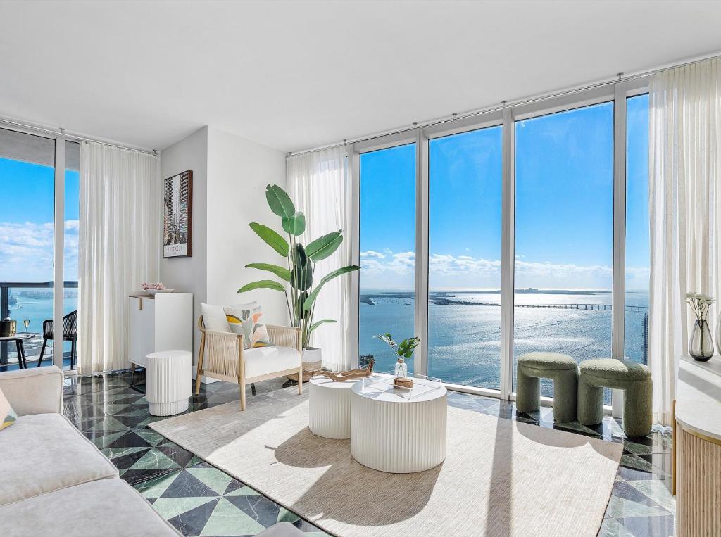 a living room with a view of the ocean at Brickell by Miami Vacation Rentals in Miami