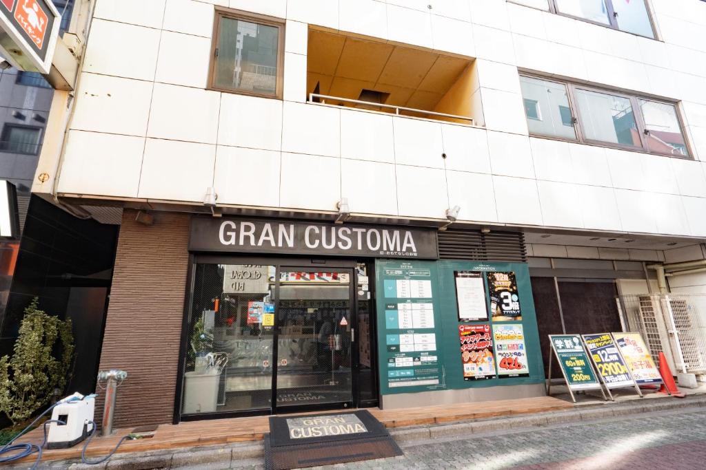 a store front of a store on a city street at Gran Custama Ueno in Tokyo