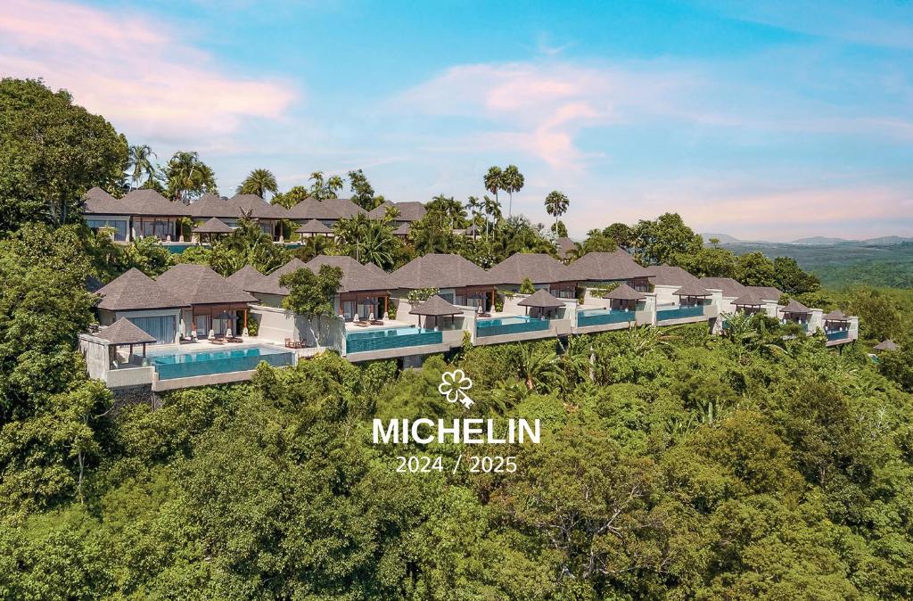 an aerial view of a resort in the jungle at The Pavilions Phuket in Bang Tao Beach