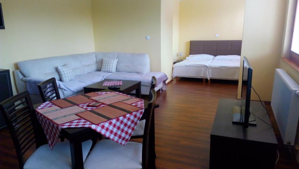 Postel nebo postele na pokoji v ubytování Guest House Mladosť