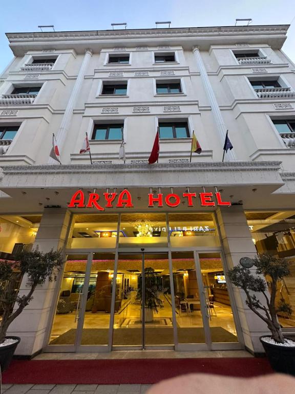 a hotel with a sign on the front of it at Arya Hotel Sakarya in Sakarya