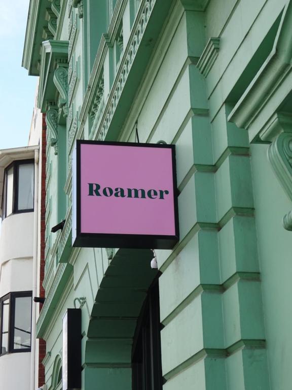 a sign that reads resonance on the side of a building at Roamer St Kilda in Melbourne