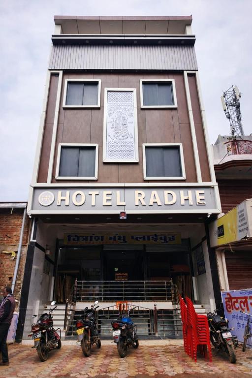 a building with motorcycles parked in front of it at Hotel Radhe in Bhind