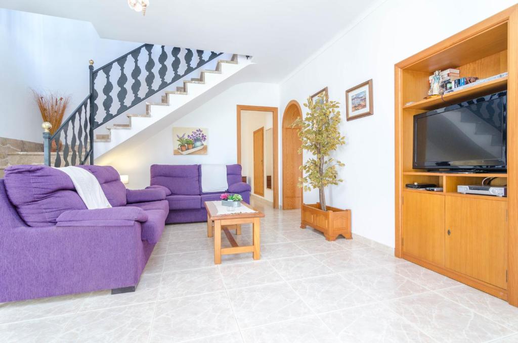 TV a/nebo společenská místnost v ubytování Torre Marina (Alga Marina)