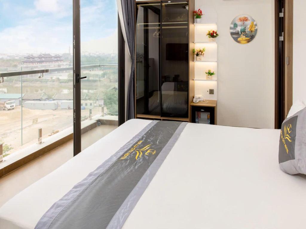 Hoa Lư City Hotel - Phố Cổ, Ninh Bình - Quarto Duplo Deluxe Com Varanda