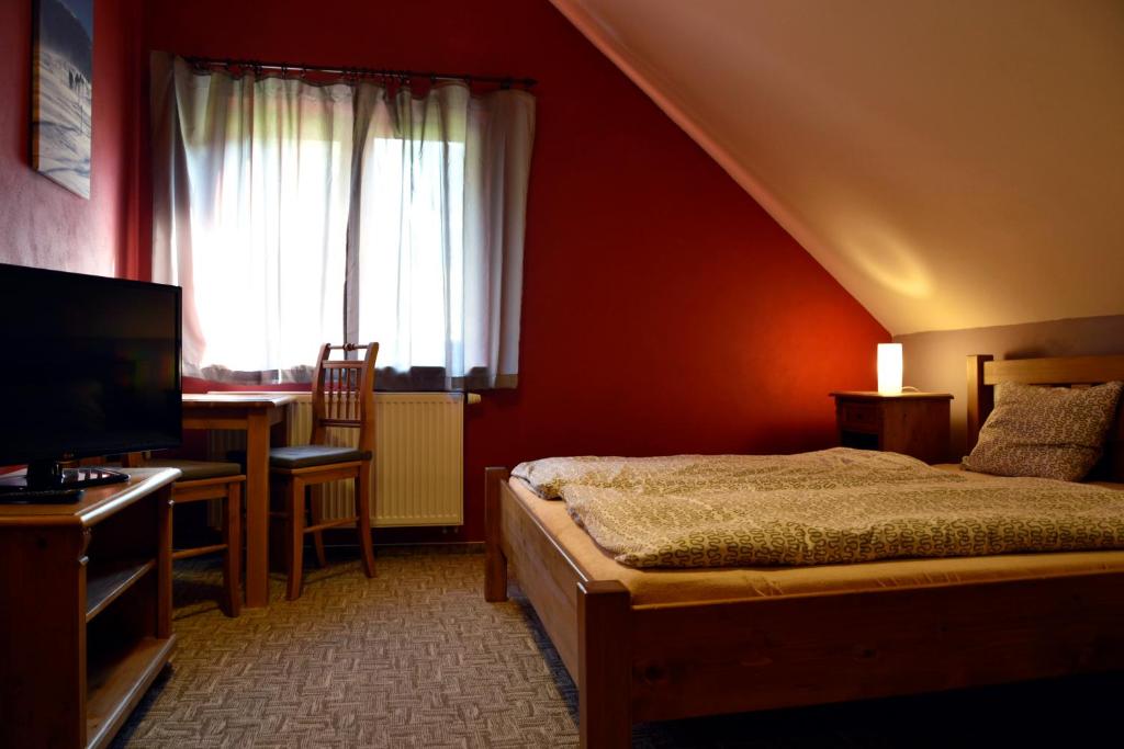 Postel nebo postele na pokoji v ubytování Apartmány u Honzy