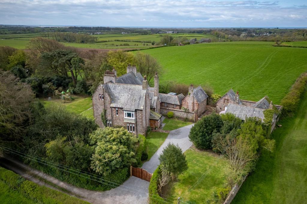 an aerial view of an old house in a field at The Old Vicarage Irton in Parton