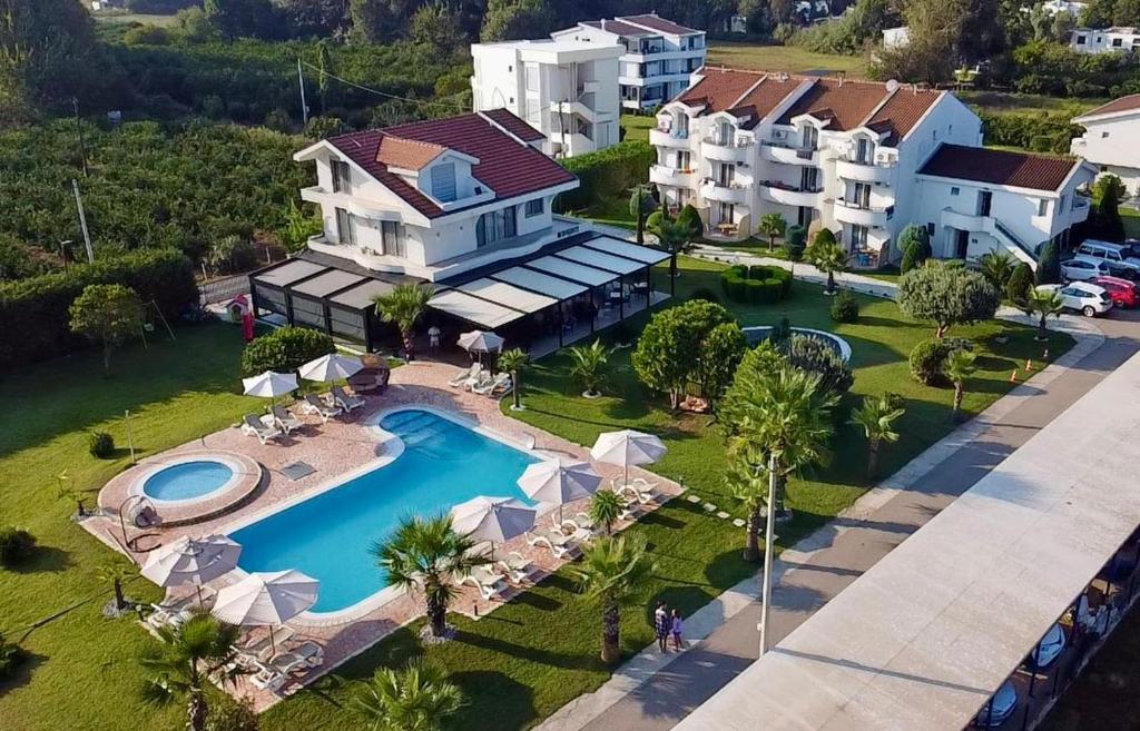 an aerial view of a house with a swimming pool at Resort Comfort - Long Beach in Ulcinj