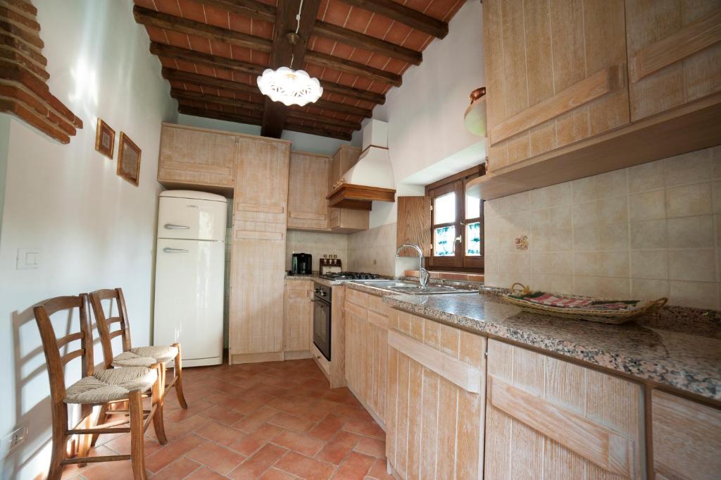 Kuchyňa alebo kuchynka v ubytovaní Agriturismo Podere il Corniolino