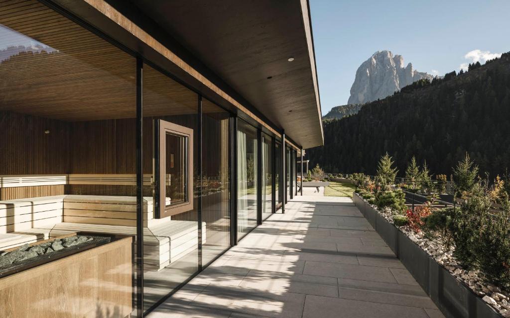 a building with a view of a mountain at Residence Sovara in Santa Cristina Gherdëina