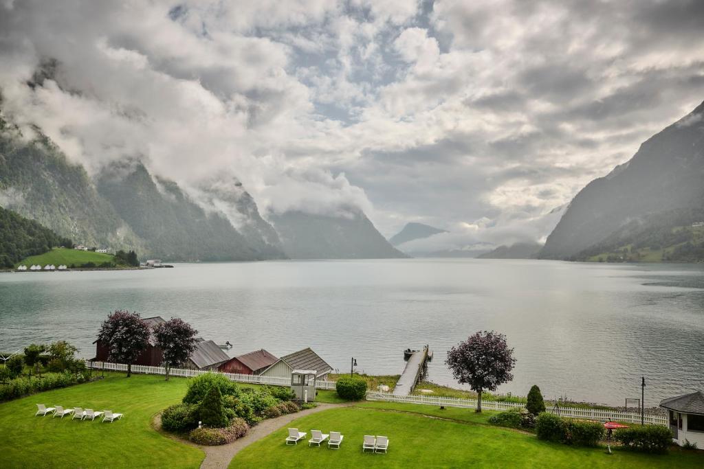 a view of a lake with mountains in the background at Skjolden Hotel in Skjolden