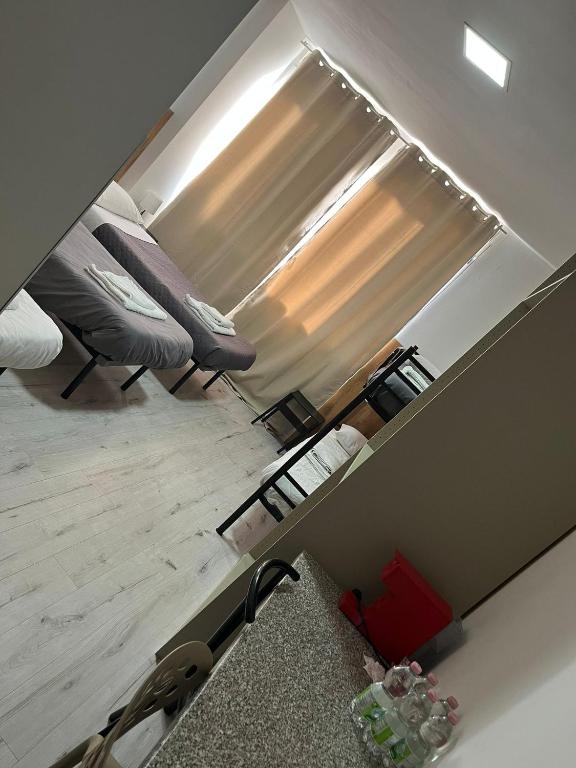 an overhead view of a living room with a mirror at MILANFORESTER in Milan