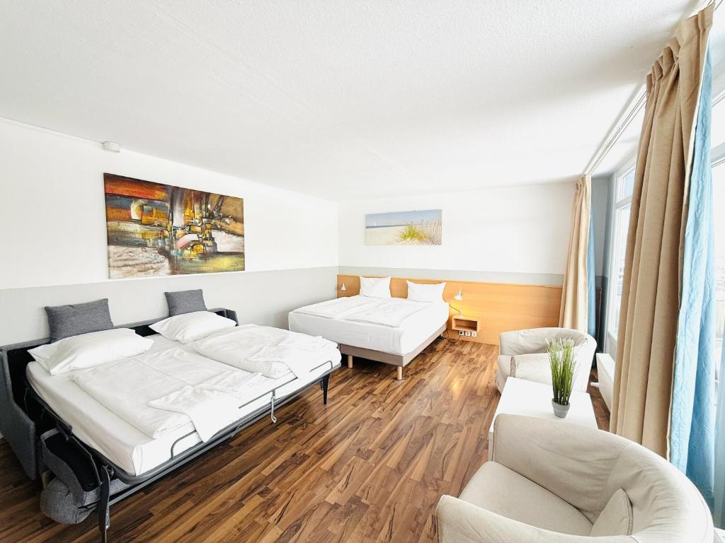 Hotel Plöner See by Tulip Inn - Familiekamer Met 1 Kingsize Bed En 1 Slaapbank