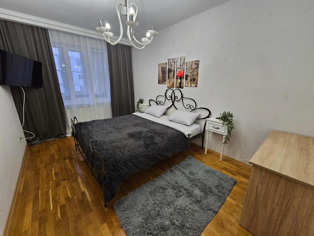 Llit o llits en una habitació de Negruzzi 2 bedrooms