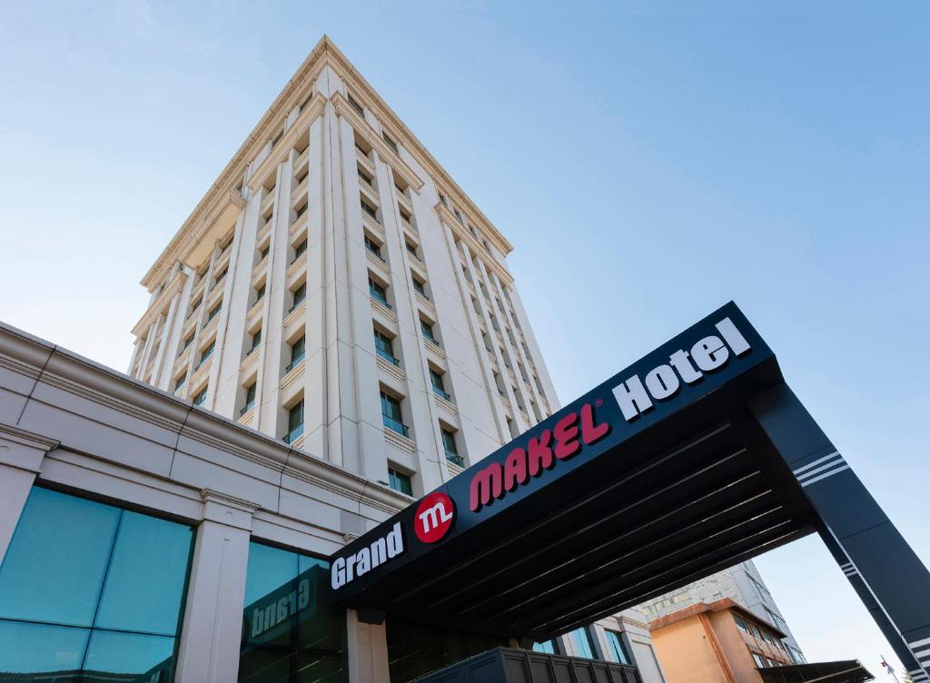 a sign for a marriott hotel in front of a building at Grand Makel Hotel Topkapi in Istanbul