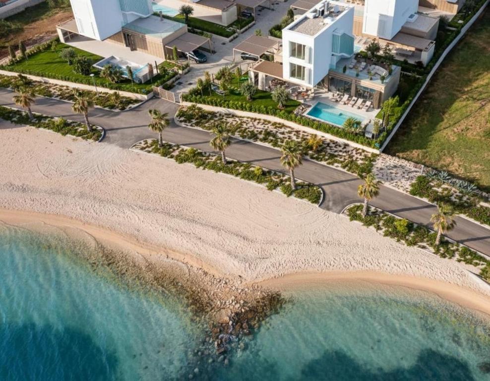 an aerial view of a beach and the ocean at Villa Valea - Managed by Excelsior Villas in Turanj