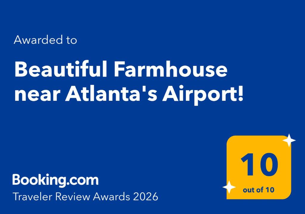 a yellow sign with the words beautiful farmhouse near atlantas airport at Beautiful Farmhouse near Atlanta's Airport! in Atlanta