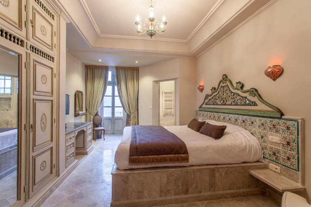 Postel nebo postele na pokoji v ubytování Maison d'Hôtes Dar Ennassim