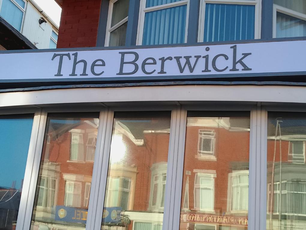 a sign that reads the benchicks on top of a building at The Berwick - Over 40's Only in Blackpool