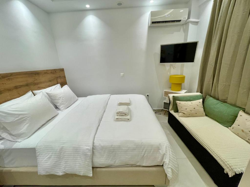 Llit o llits en una habitació de Athenee Riviera