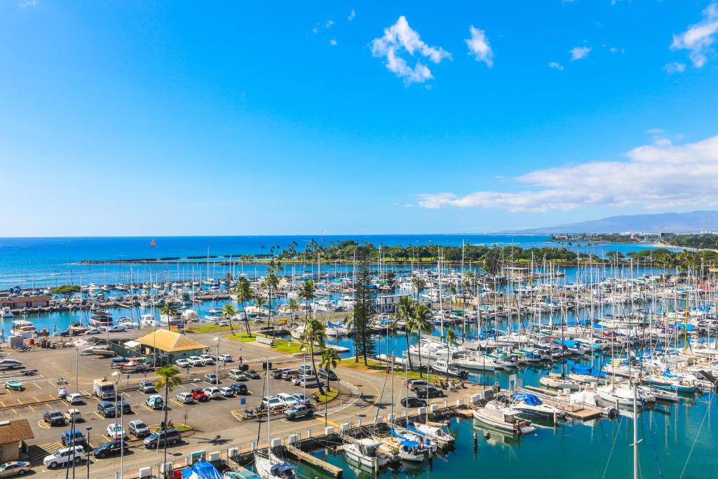 an aerial view of a marina with boats in the water at Ilikai Tower 943 in Honolulu
